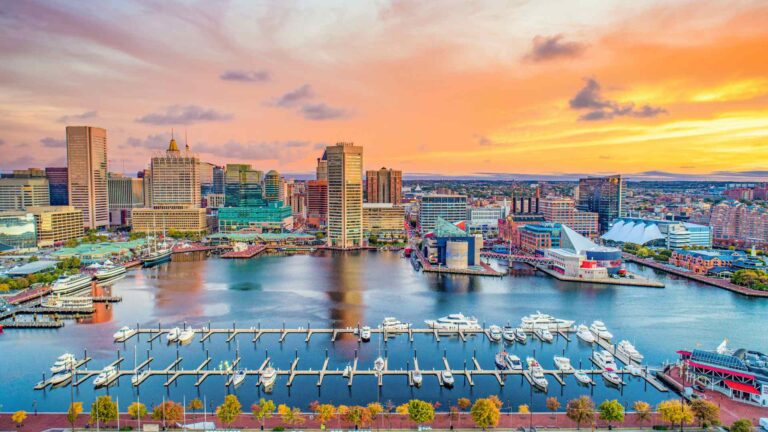 Aerial view of Baltimore's Inner Harbor and marina at sunset