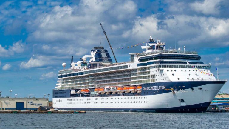 Celebrity Cruises ship docked at Port Everglades beneath a cloudy sky