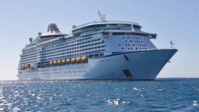 Large cruise ship sailing through open water near Galveston