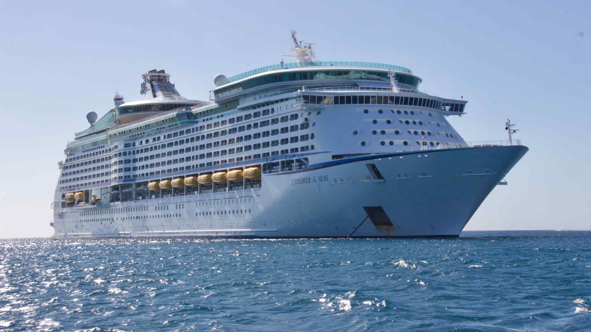 Large cruise ship sailing through open water near Galveston