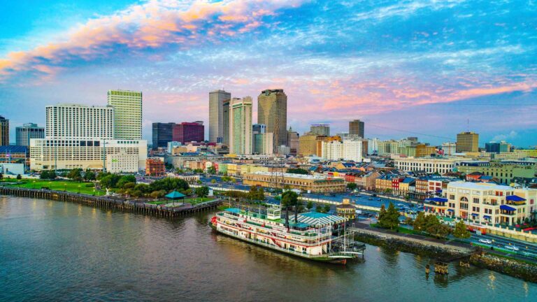 New Orleans riverfront skyline with a steamboat on the Mississippi River
