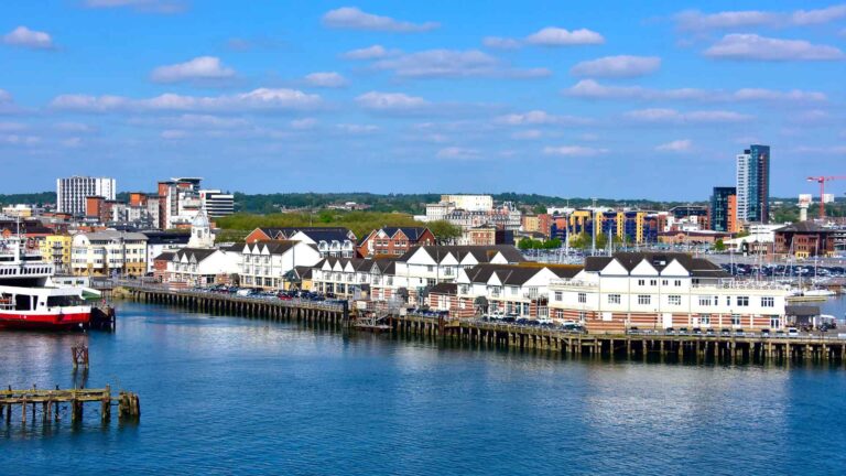 Southampton cruise terminal and waterfront buildings across the harbor