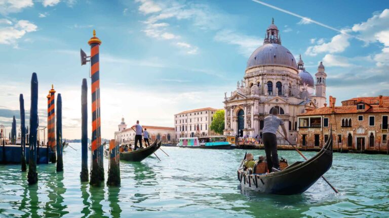 Gondola crossing the Grand Canal near Santa Maria della Salute in Venice