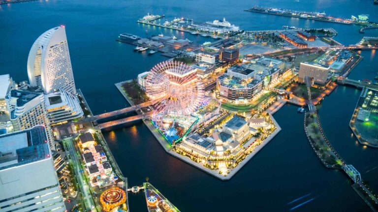 Aerial evening view of Yokohama's illuminated Minato Mirai waterfront