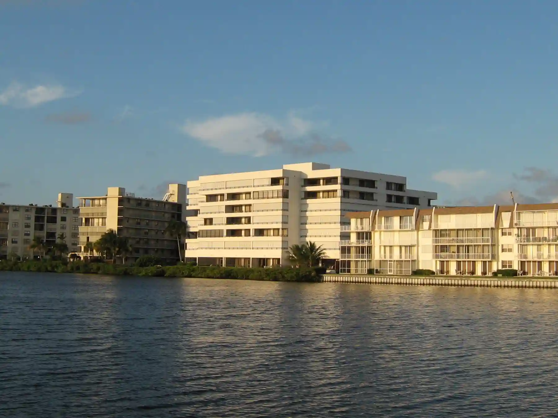 Palm Beach waterfront buildings viewed across the waterway.