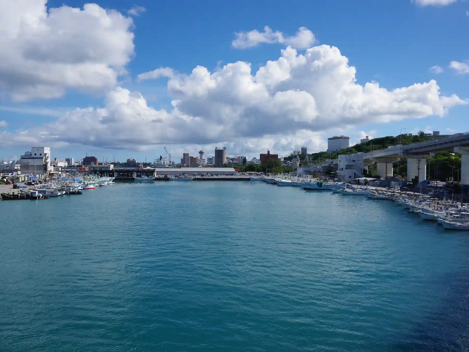 Boats and waterfront viewed across Naha Port in Okinawa.