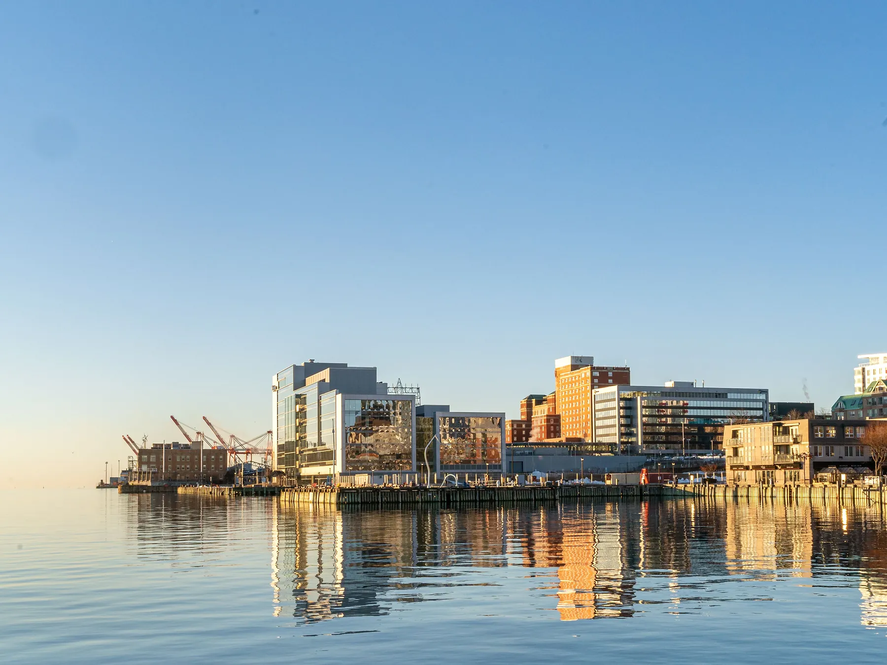 Halifax waterfront and city skyline across calm harbor water