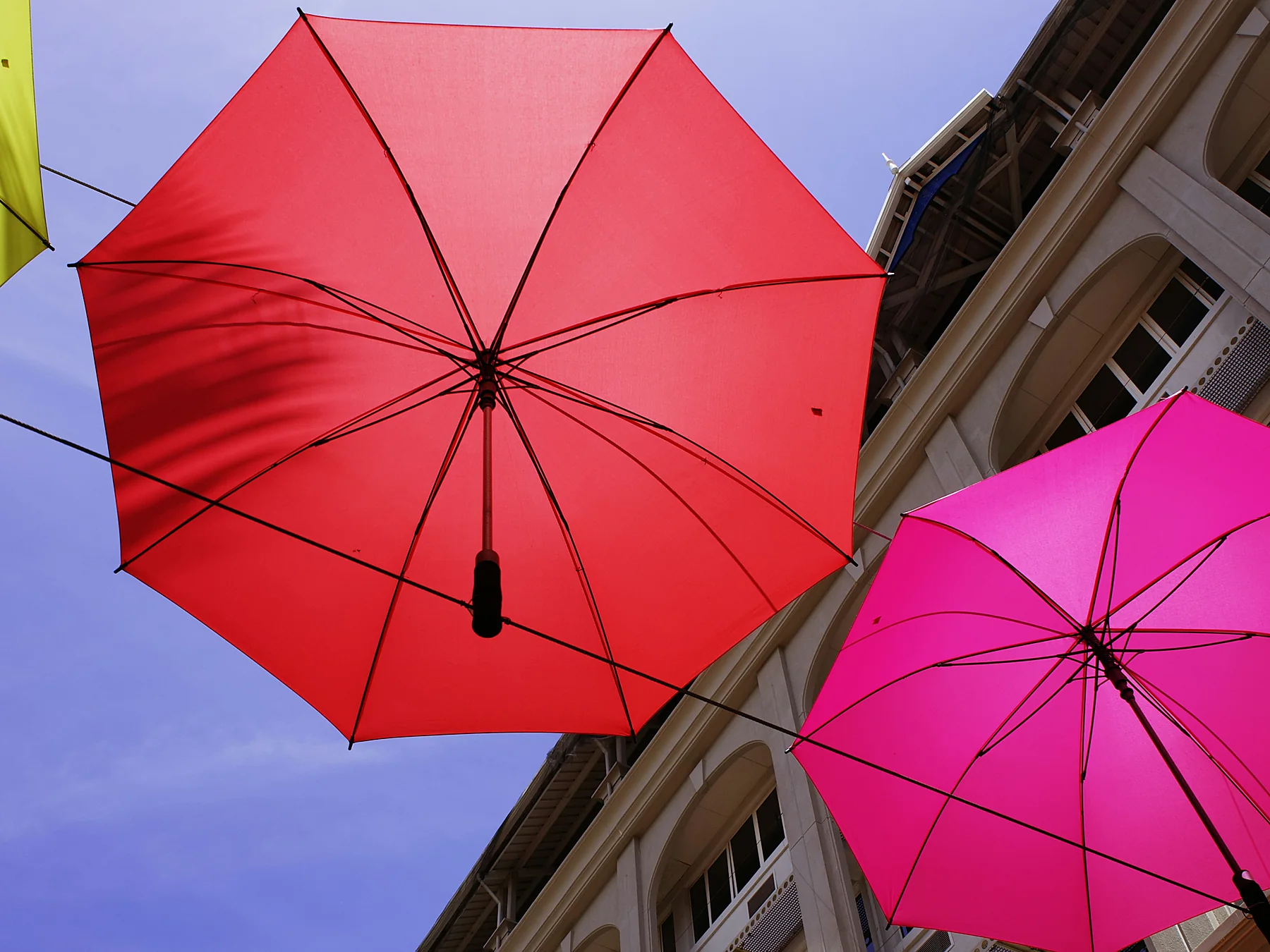 Colorful umbrellas decorating a public space in Port Louis, Mauritius