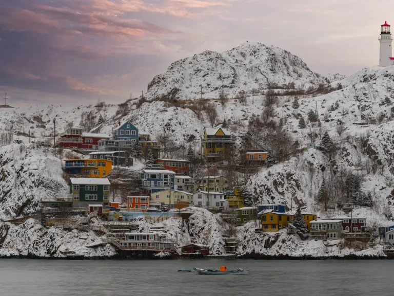 Snow-covered Battery neighborhood and Signal Hill above St. John's harbor
