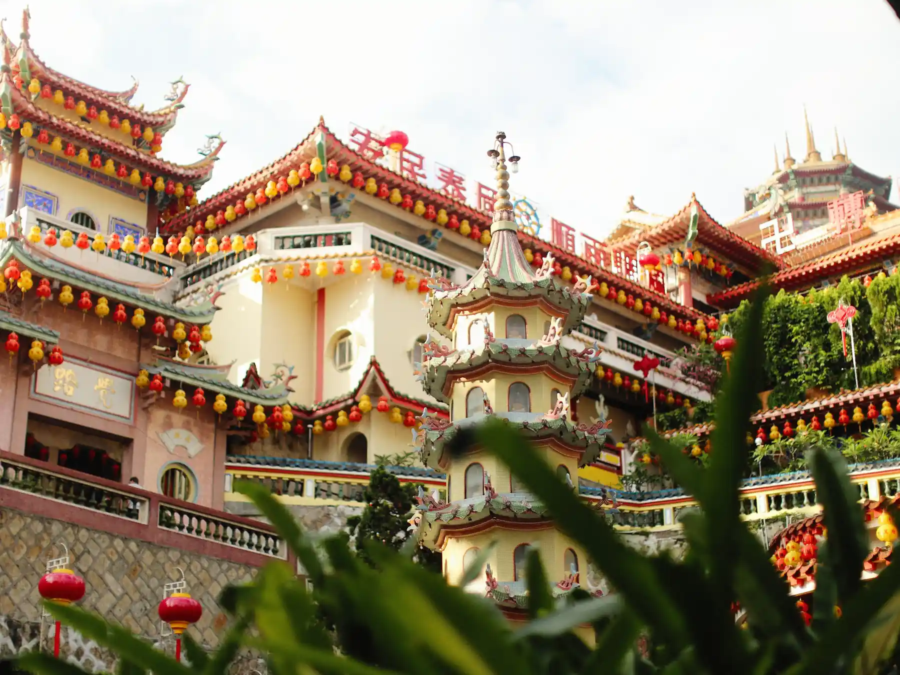 Colorful lanterns and traditional architecture at Kek Lok Si Temple in Penang.