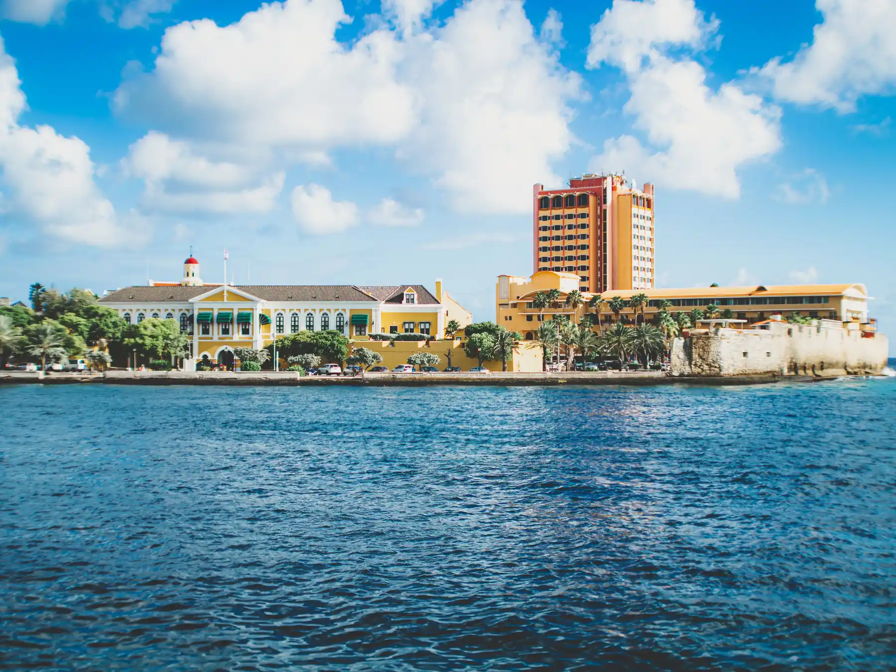 Governor's Palace and colorful architecture on the Willemstad waterfront.