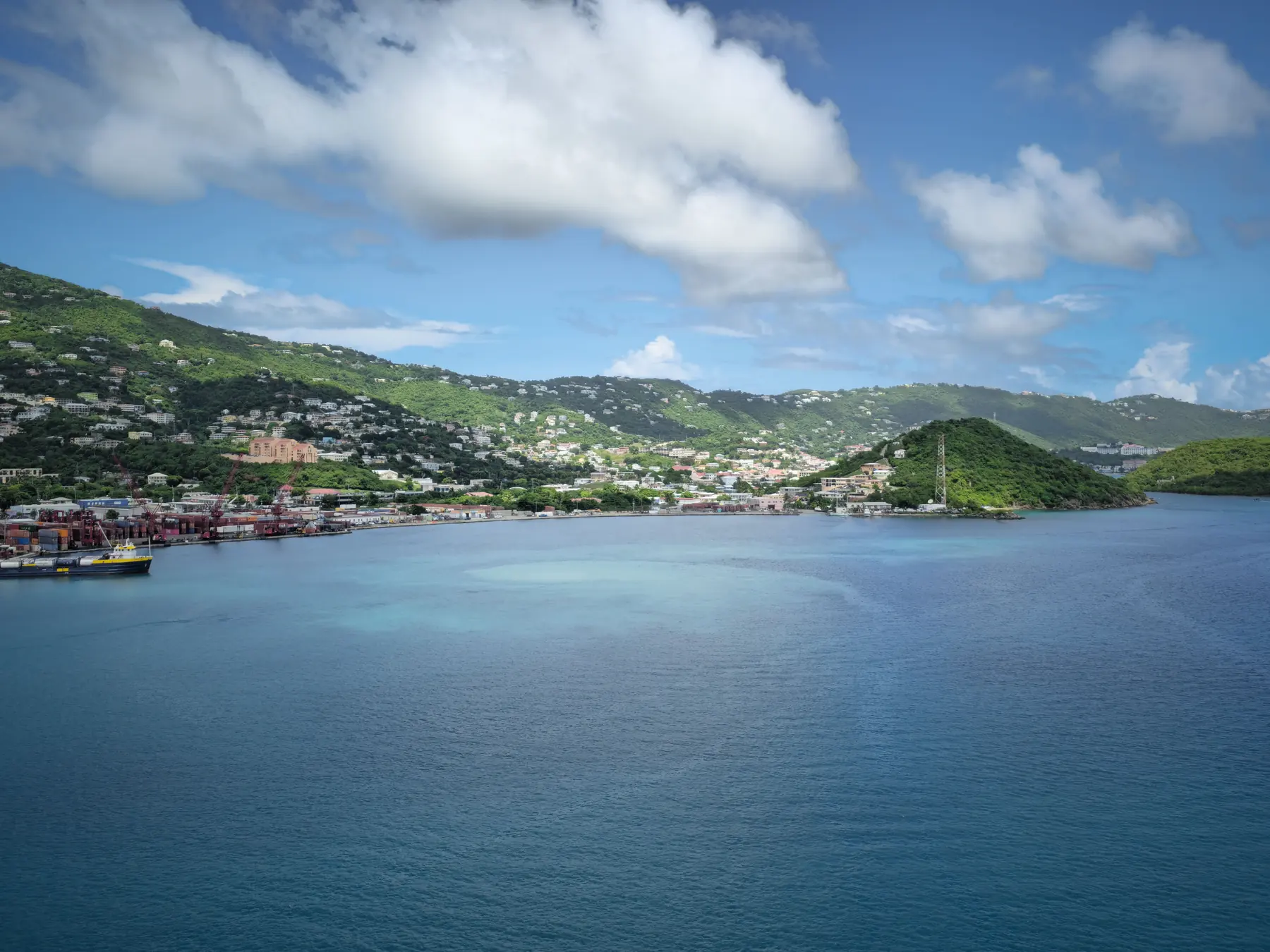 Blue water and green hills around St. Thomas harbor near Charlotte Amalie.