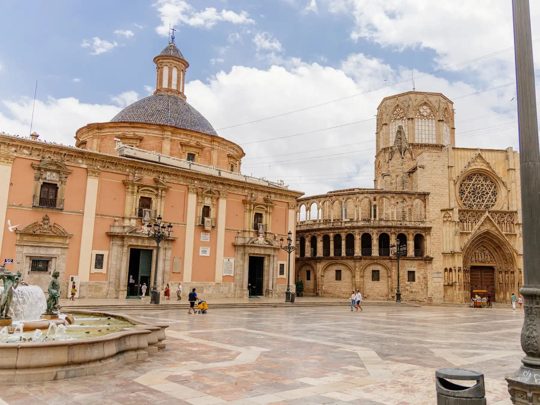 Valencia Cathedral and the Basilica overlooking Plaza de la Virgen in the historic center.