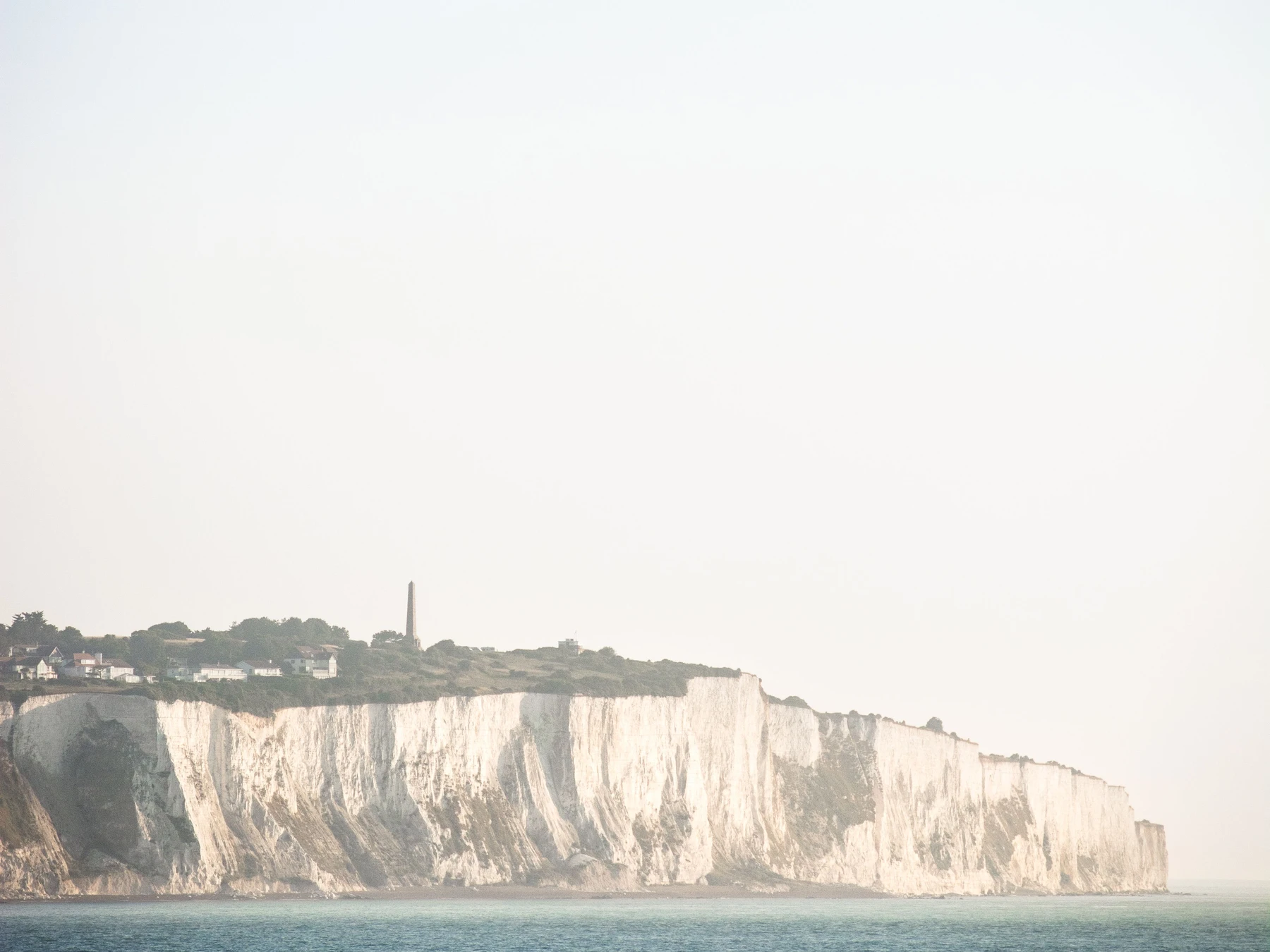 The White Cliffs of Dover seen across the English Channel in soft coastal light.