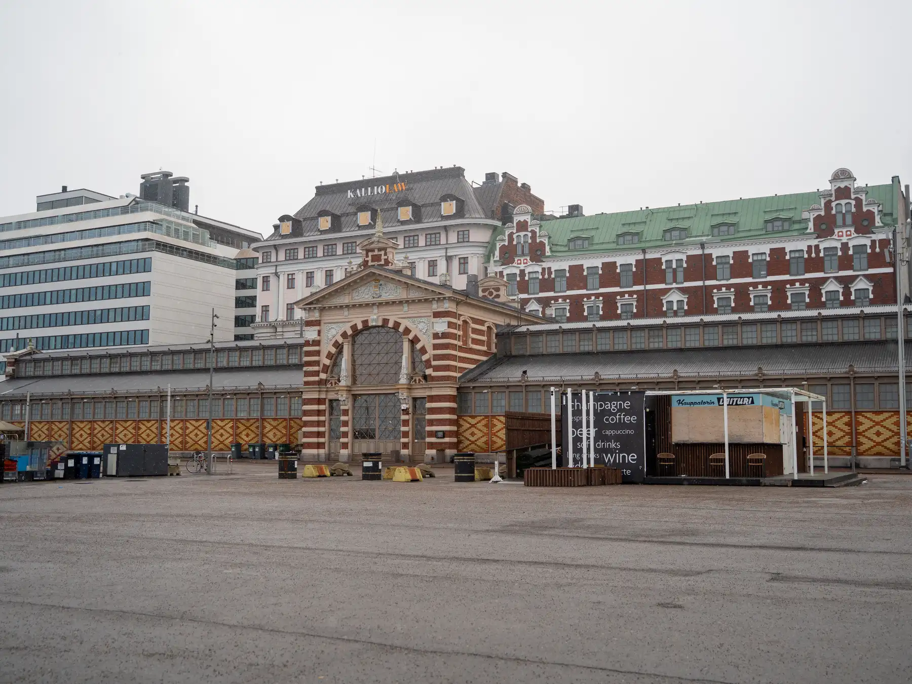 Historic red-and-cream Old Market Hall on the Helsinki waterfront.
