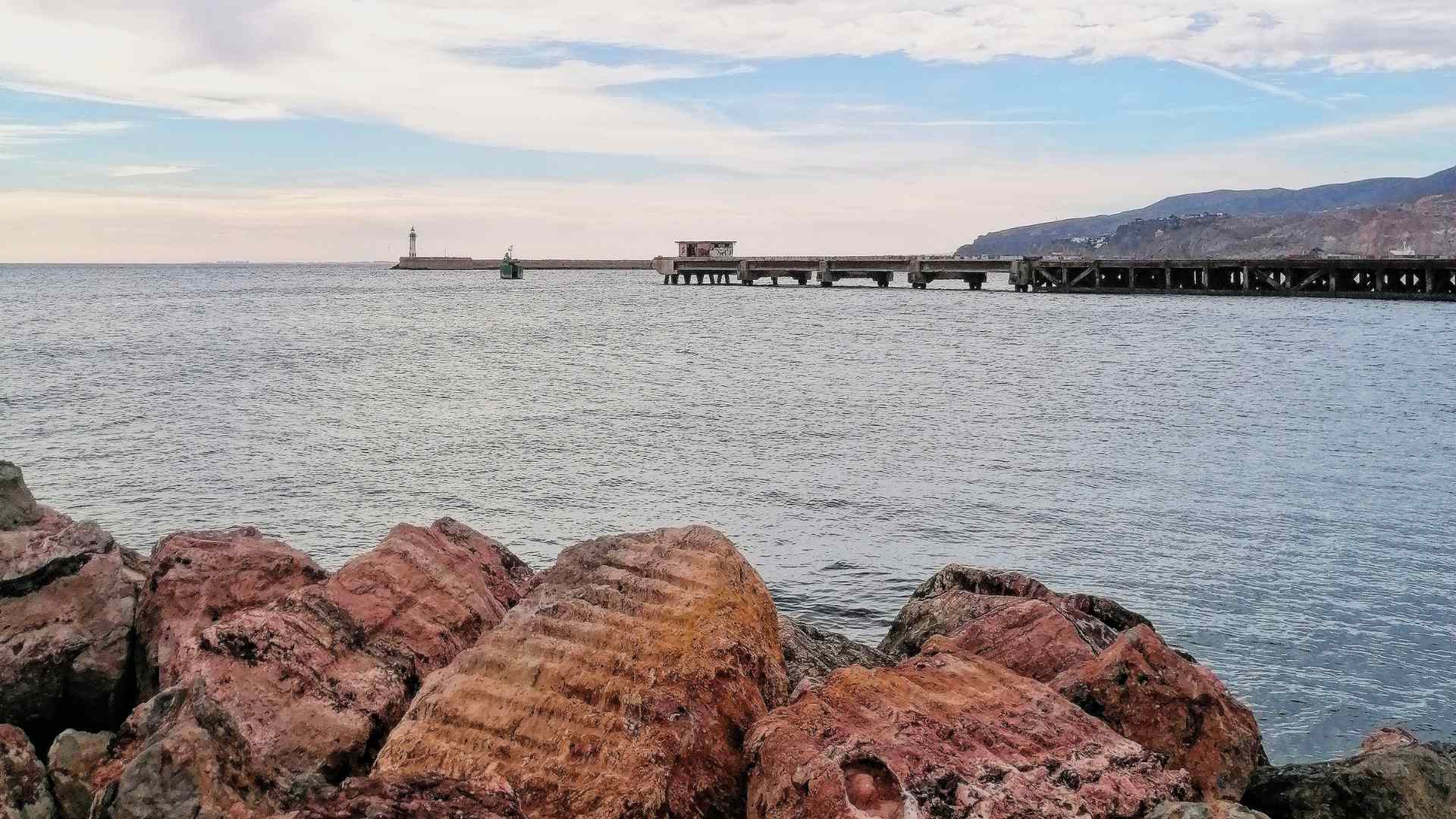 Long pier extending into the sea near Almeria