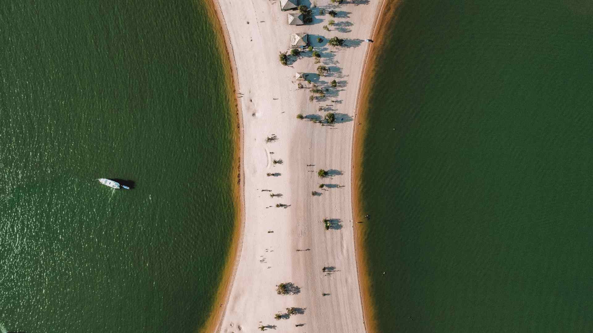 Top-down view of a sandy Amazon river beach at Alter do Chao