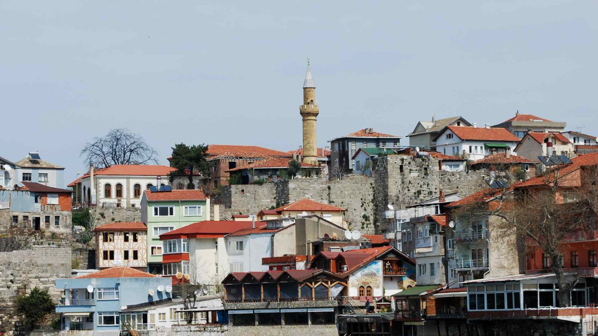 Historic wooden houses and mosque minaret in Amasra