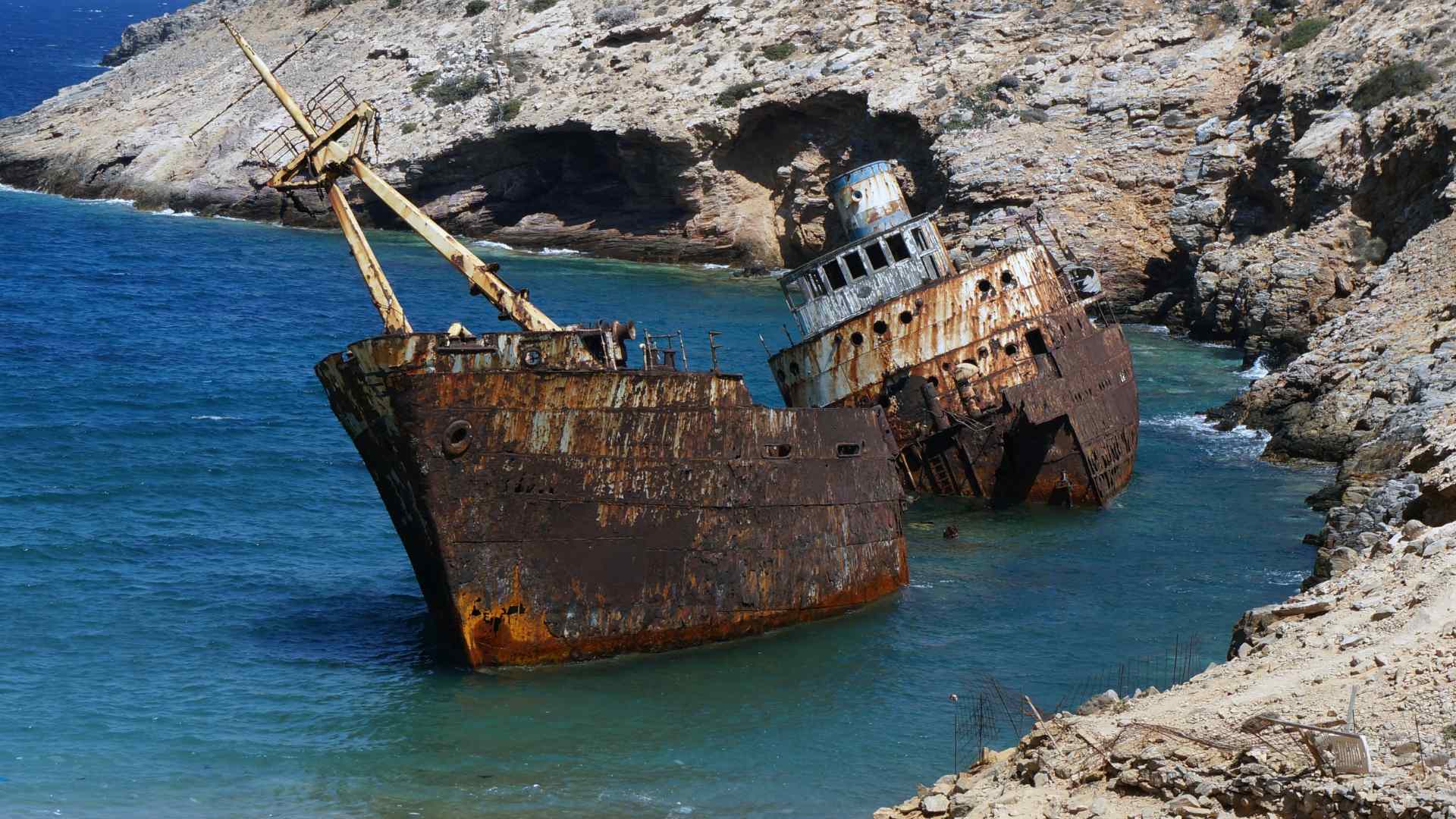 Rusting Olympia shipwreck on the rocky coast of Amorgos
