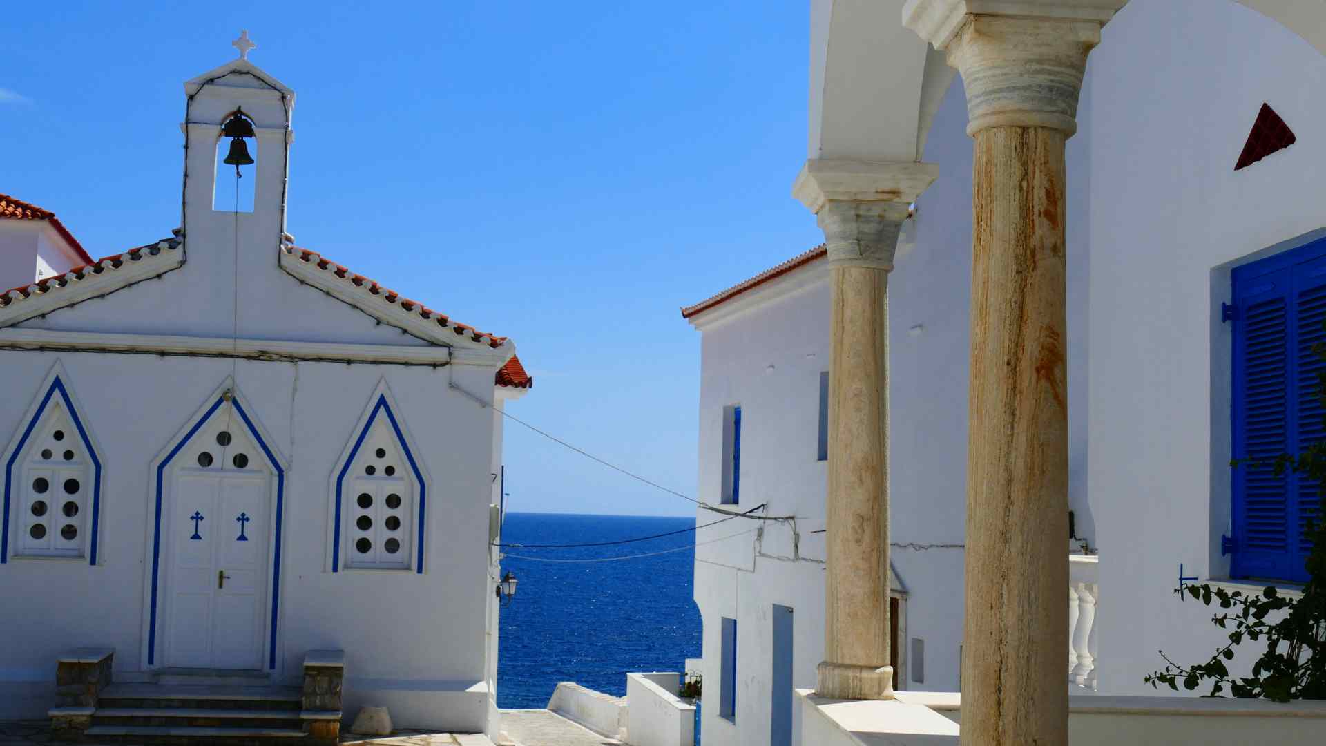 Whitewashed seaside chapel on the island of Andros