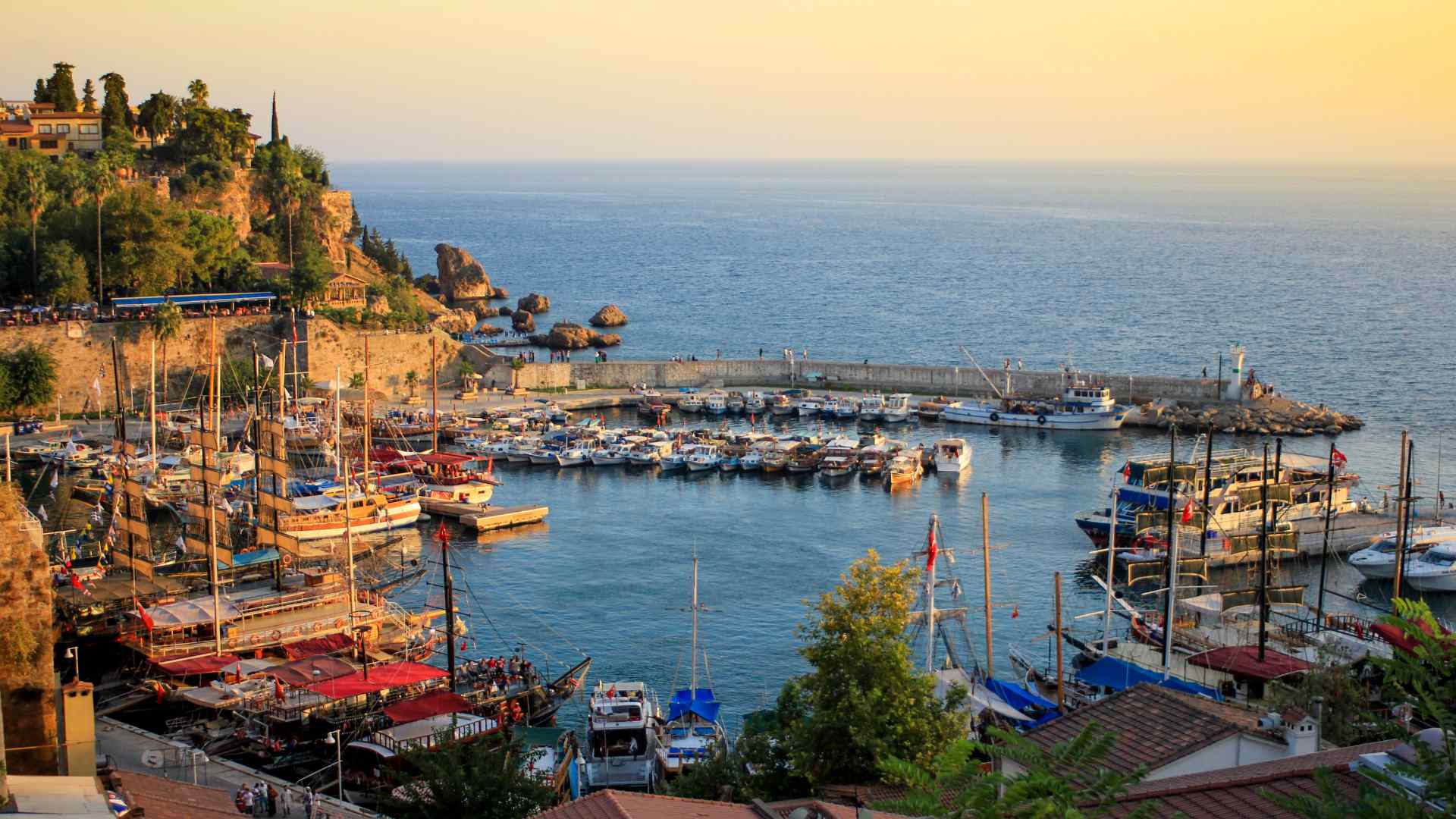 Antalya Old Harbor filled with boats at sunset