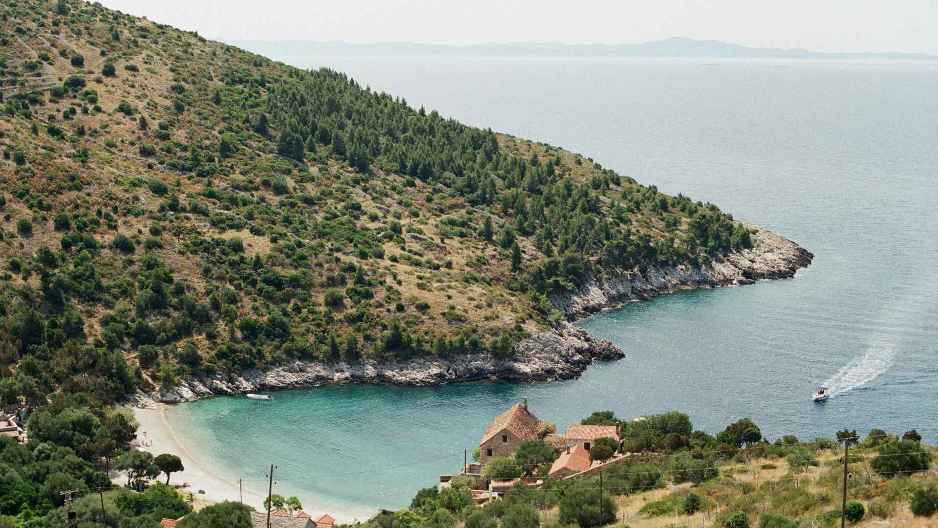 Boat entering a sheltered cove on the Gallipoli coast