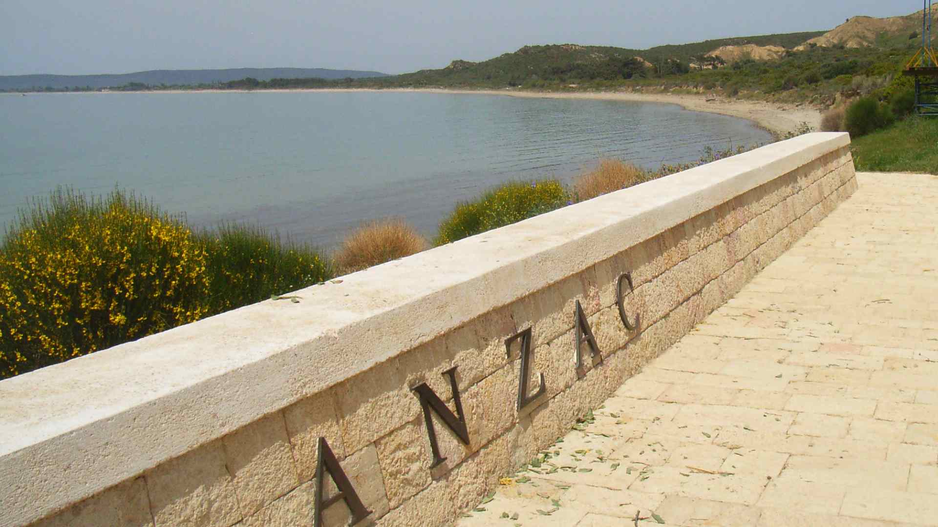 Anzac Cove memorial inscription beside the Gallipoli shore