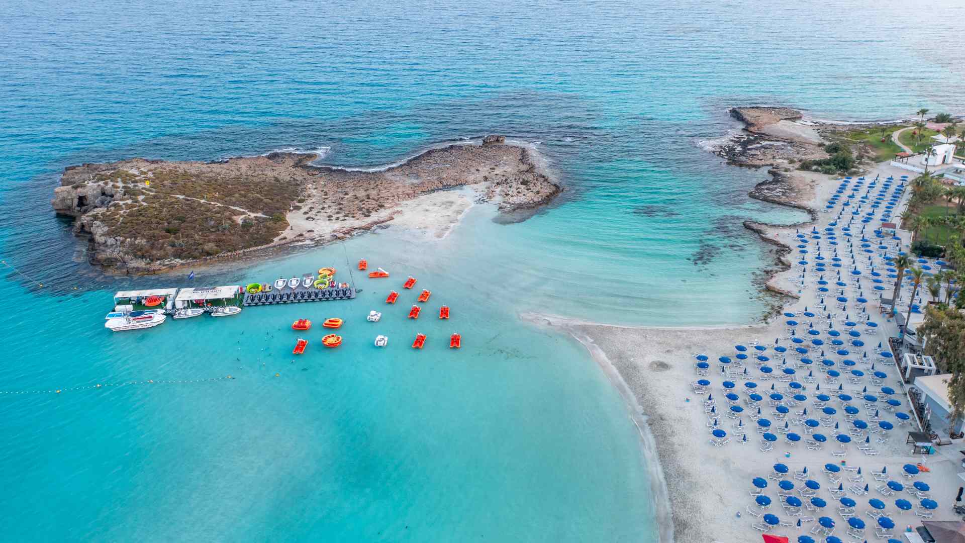 Aerial view of a turquoise swimming cove in Ayia Napa
