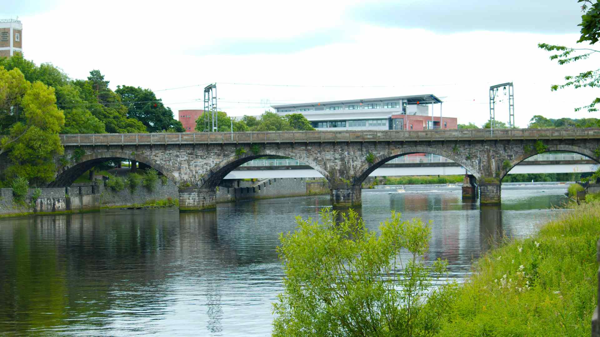 Historic stone bridge over the River Ayr in Scotland