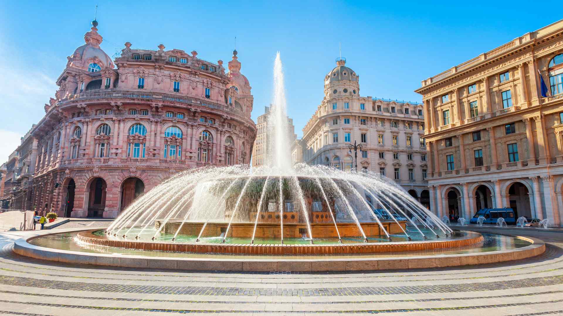 Piazza De Ferrari fountain and historic buildings in Genoa