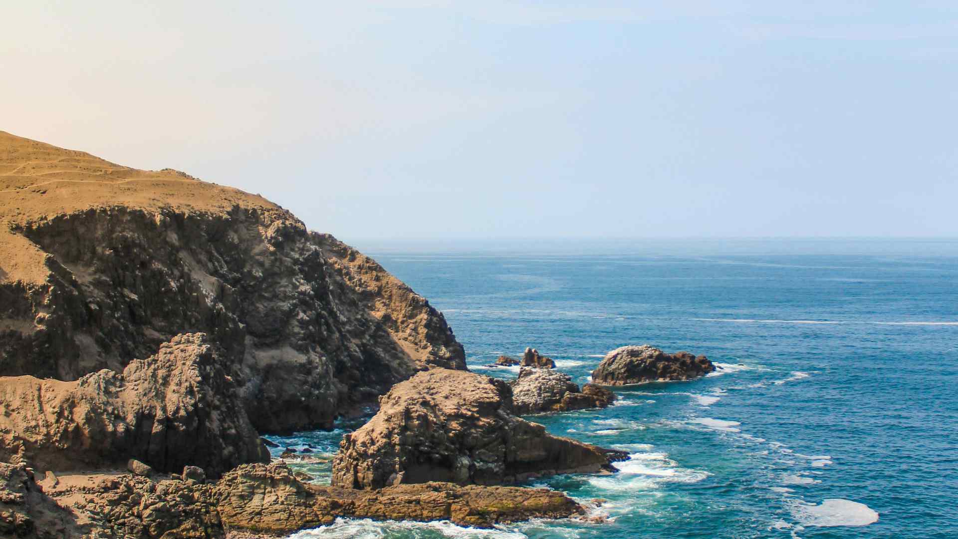 Rocky Pacific coastline near Callao, Peru