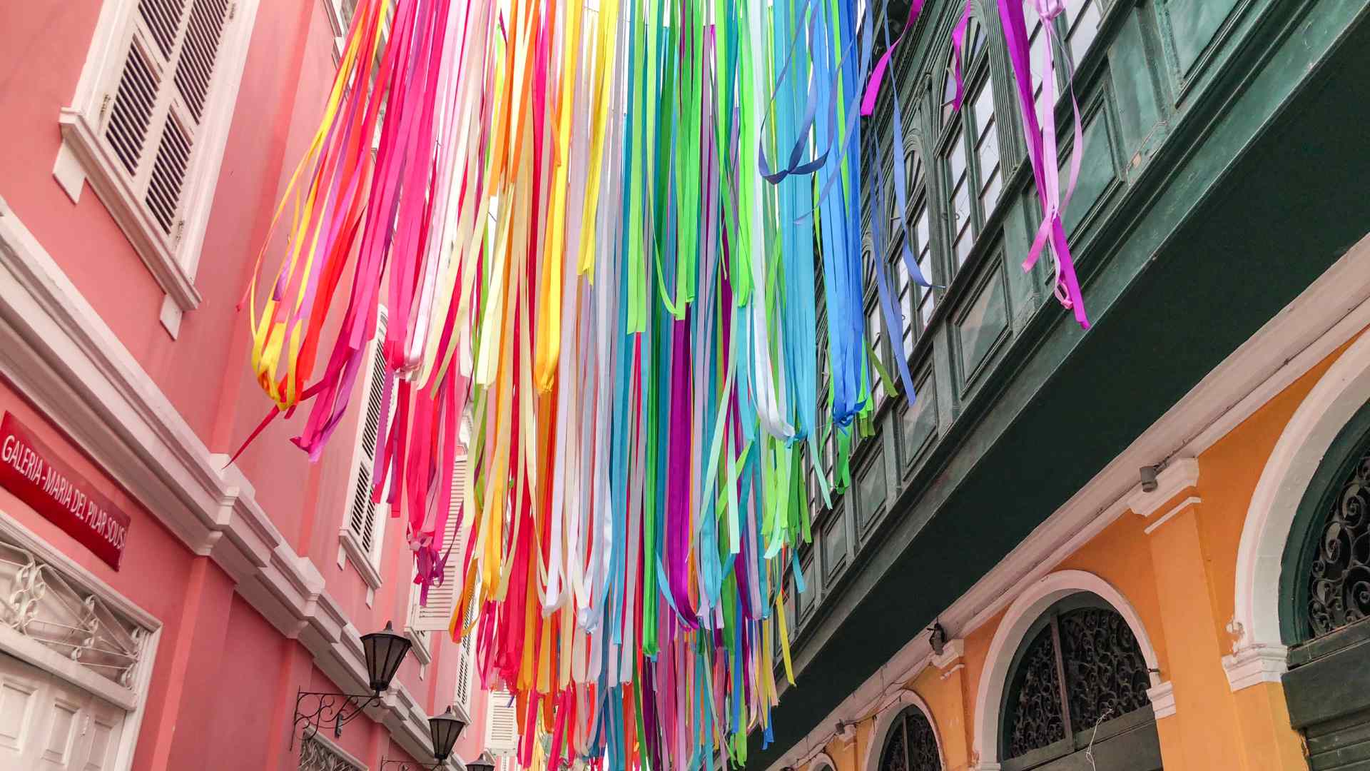 Colorful ribbon installation in historic Callao, Peru