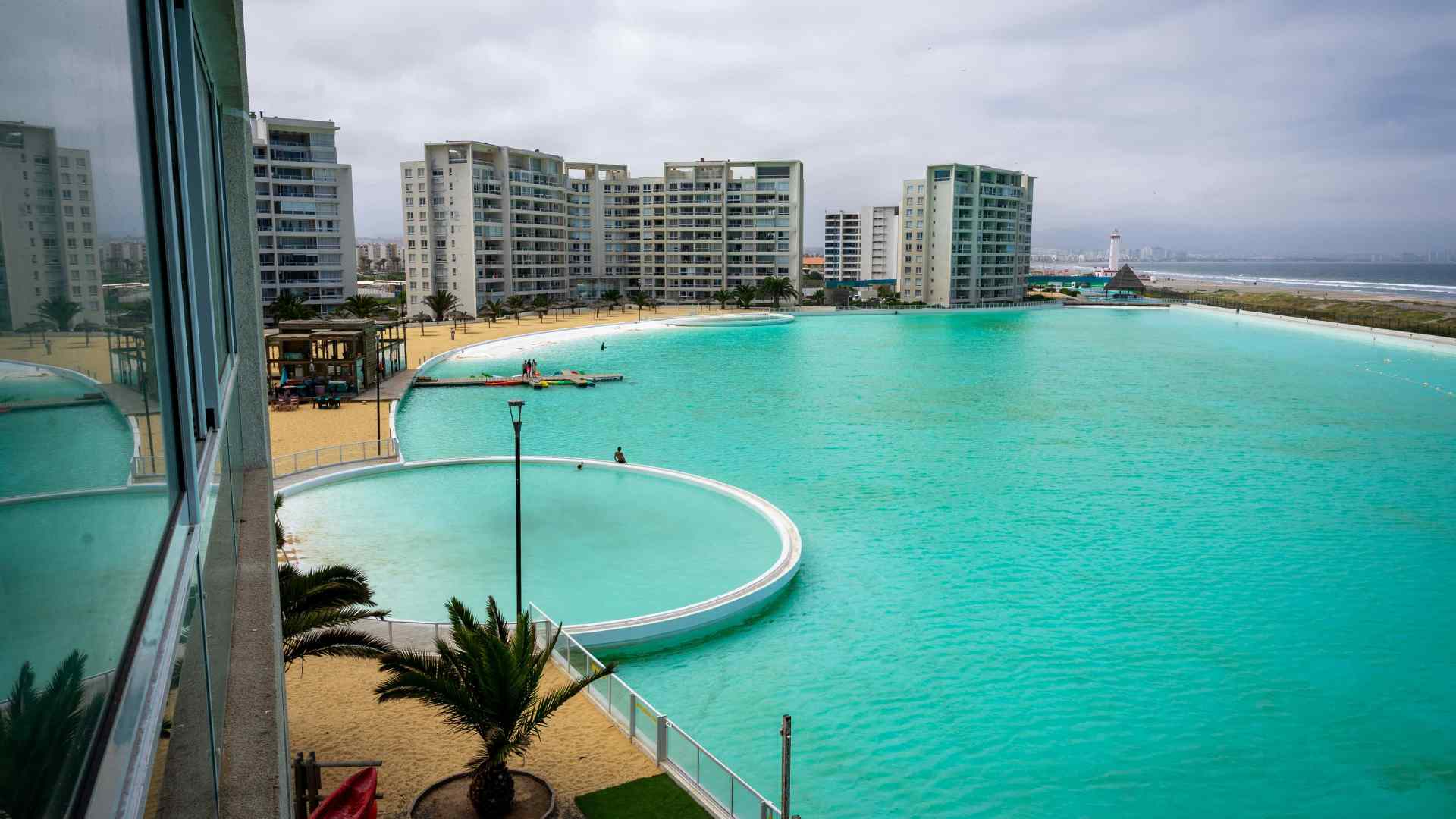 Turquoise lagoon and modern waterfront apartments near Coquimbo
