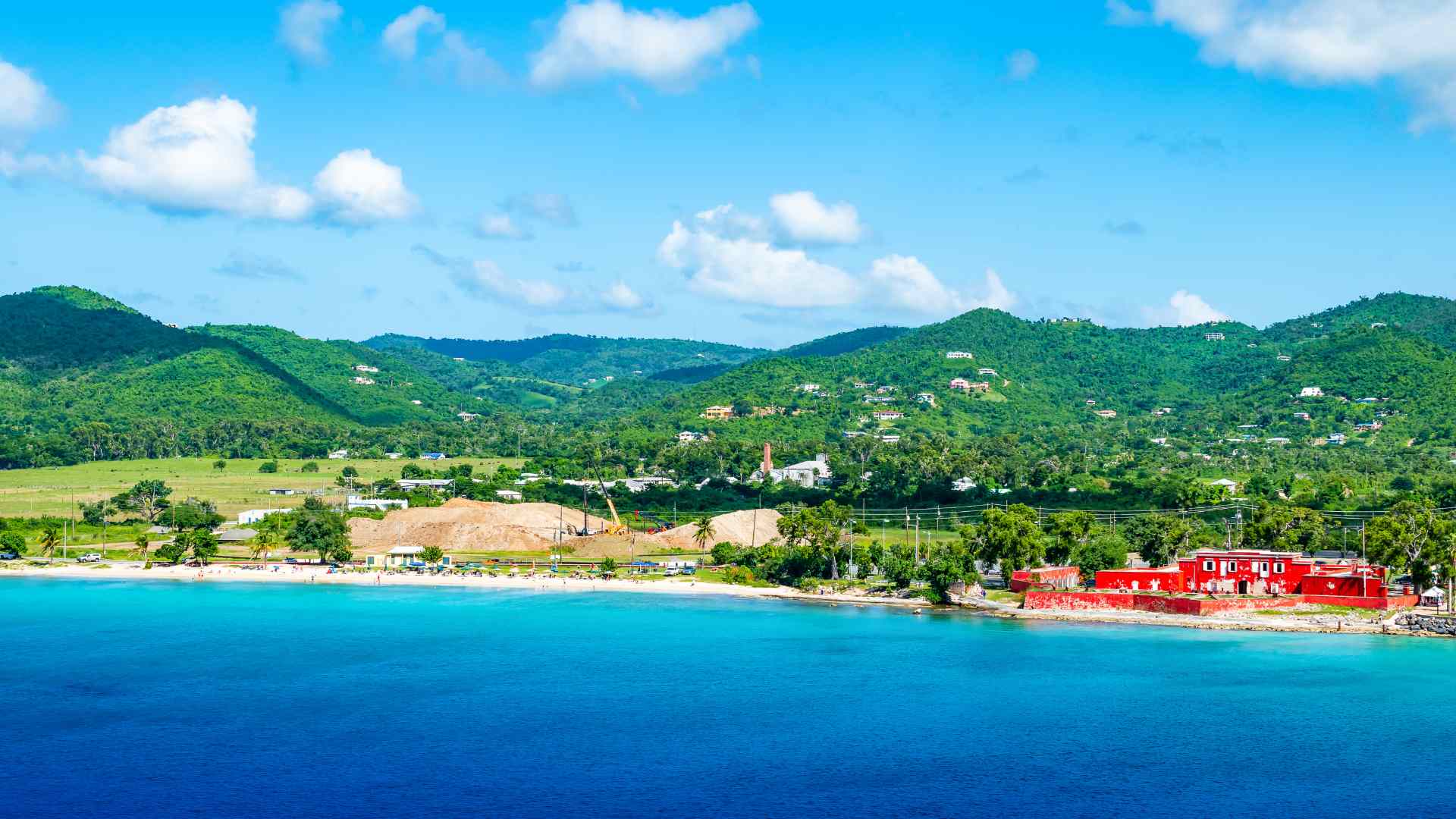 Turquoise beach and lush hills near Frederiksted, St Croix