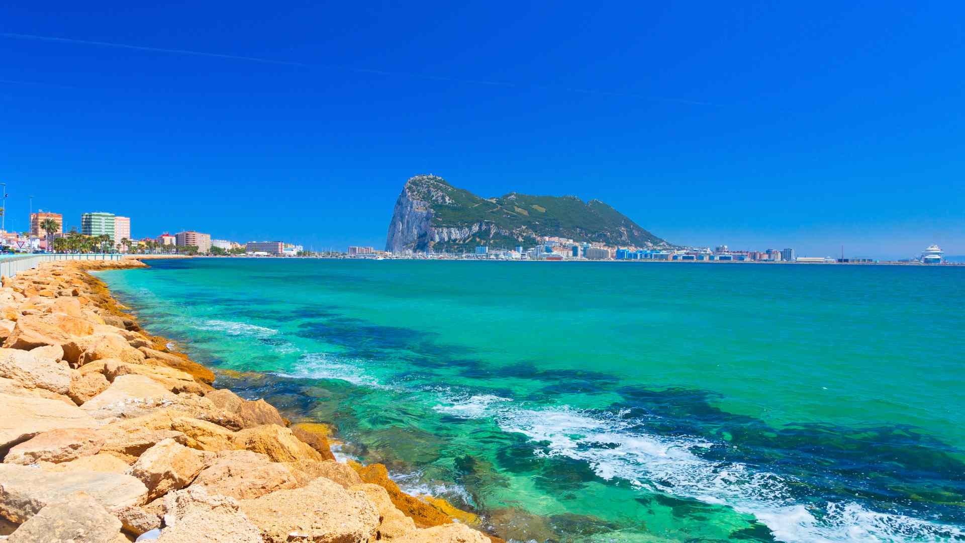 Rock of Gibraltar seen from the turquoise Mediterranean coast