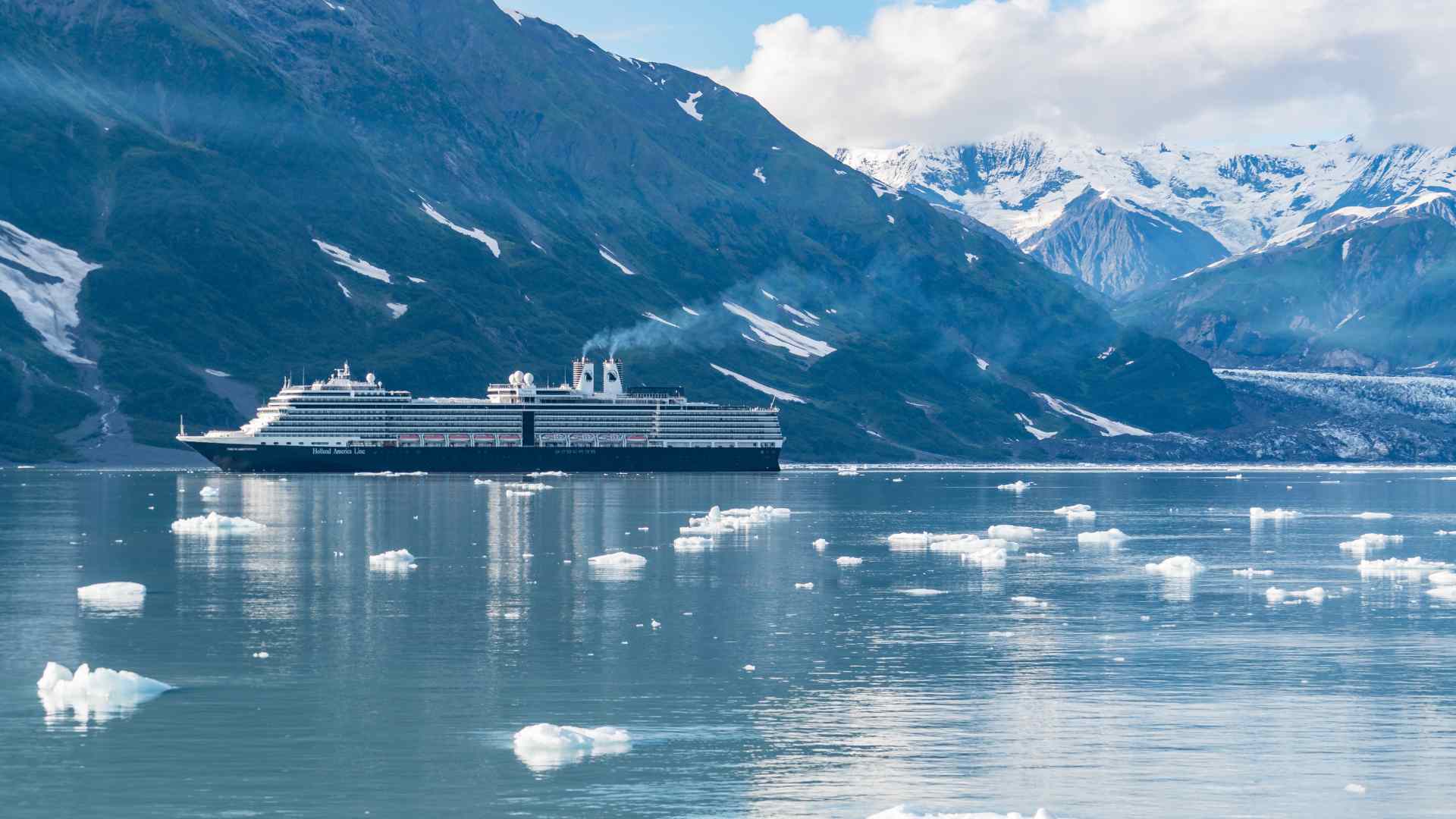 Cruise ship sailing among ice floes in Glacier Bay, Alaska