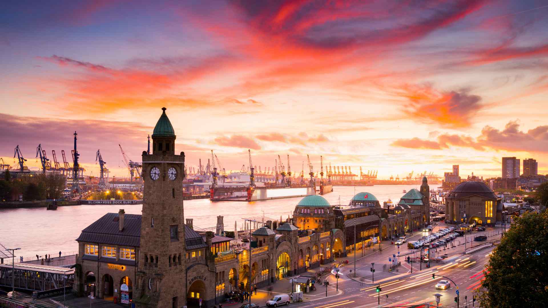 St Pauli Landungsbrucken and Hamburg harbor at sunset