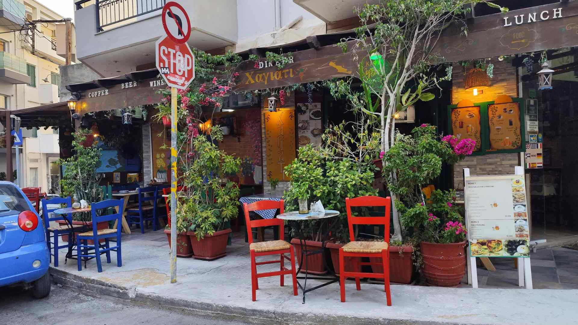 Outdoor cafe on a lively street in Heraklion, Crete