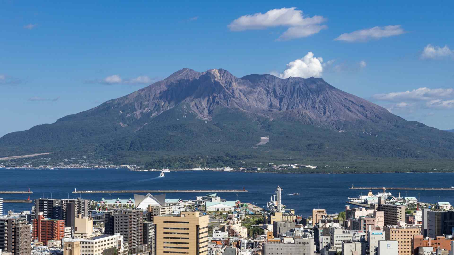 Sakurajima volcano towering over Kagoshima, Japan