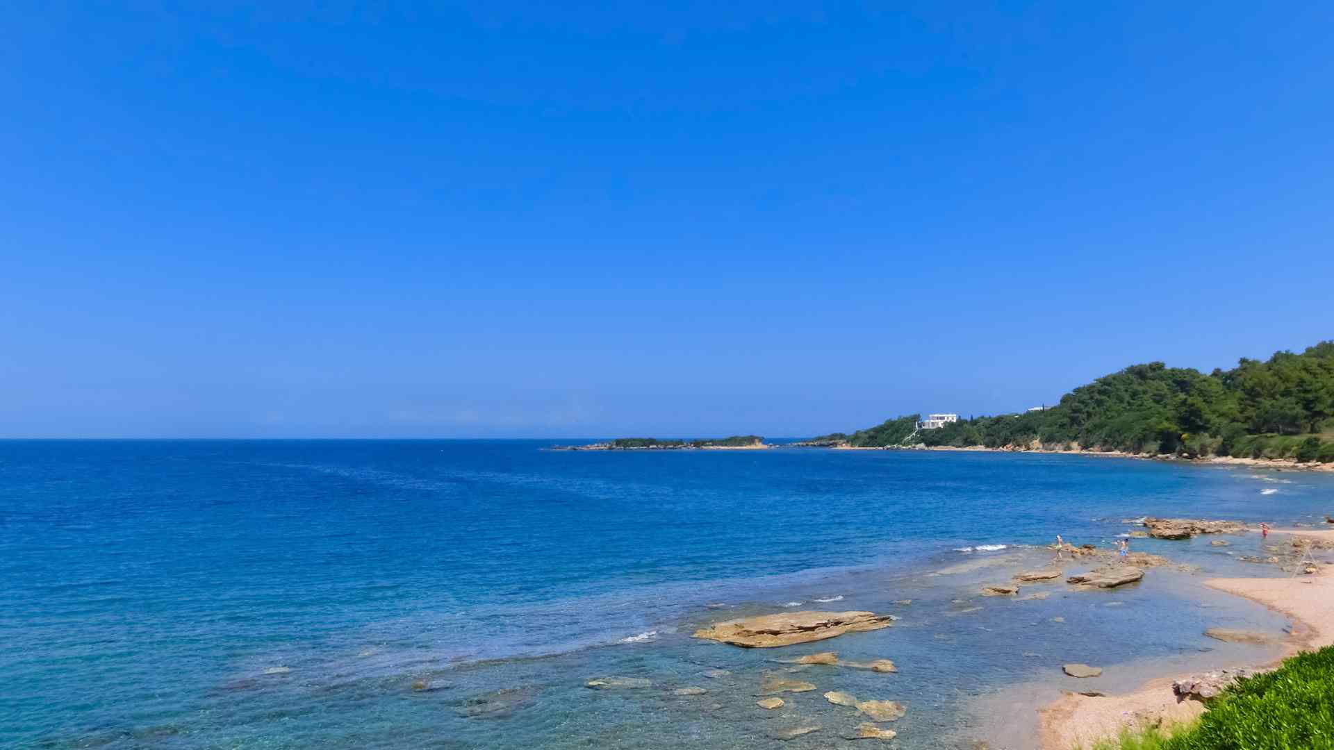 Sandy beach and blue Ionian Sea near Katakolon