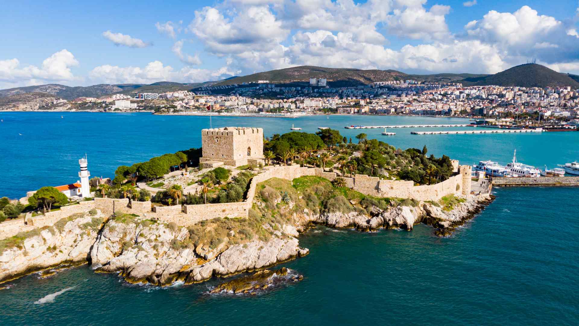 Kusadasi's Pigeon Island castle surrounded by turquoise water