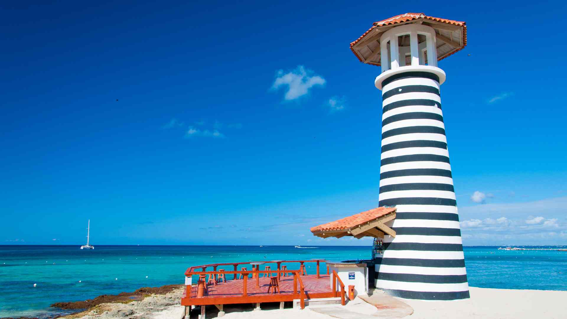 Black-and-white lighthouse beside the Caribbean Sea near La Romana