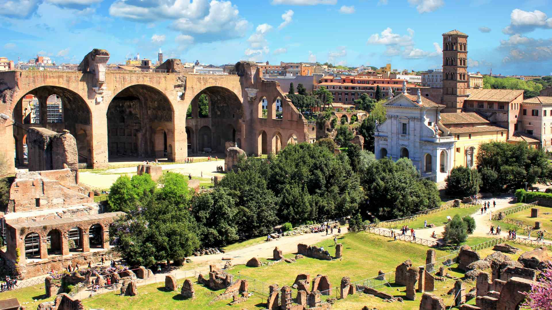 Ancient Roman ruins and arches in Rome, Italy