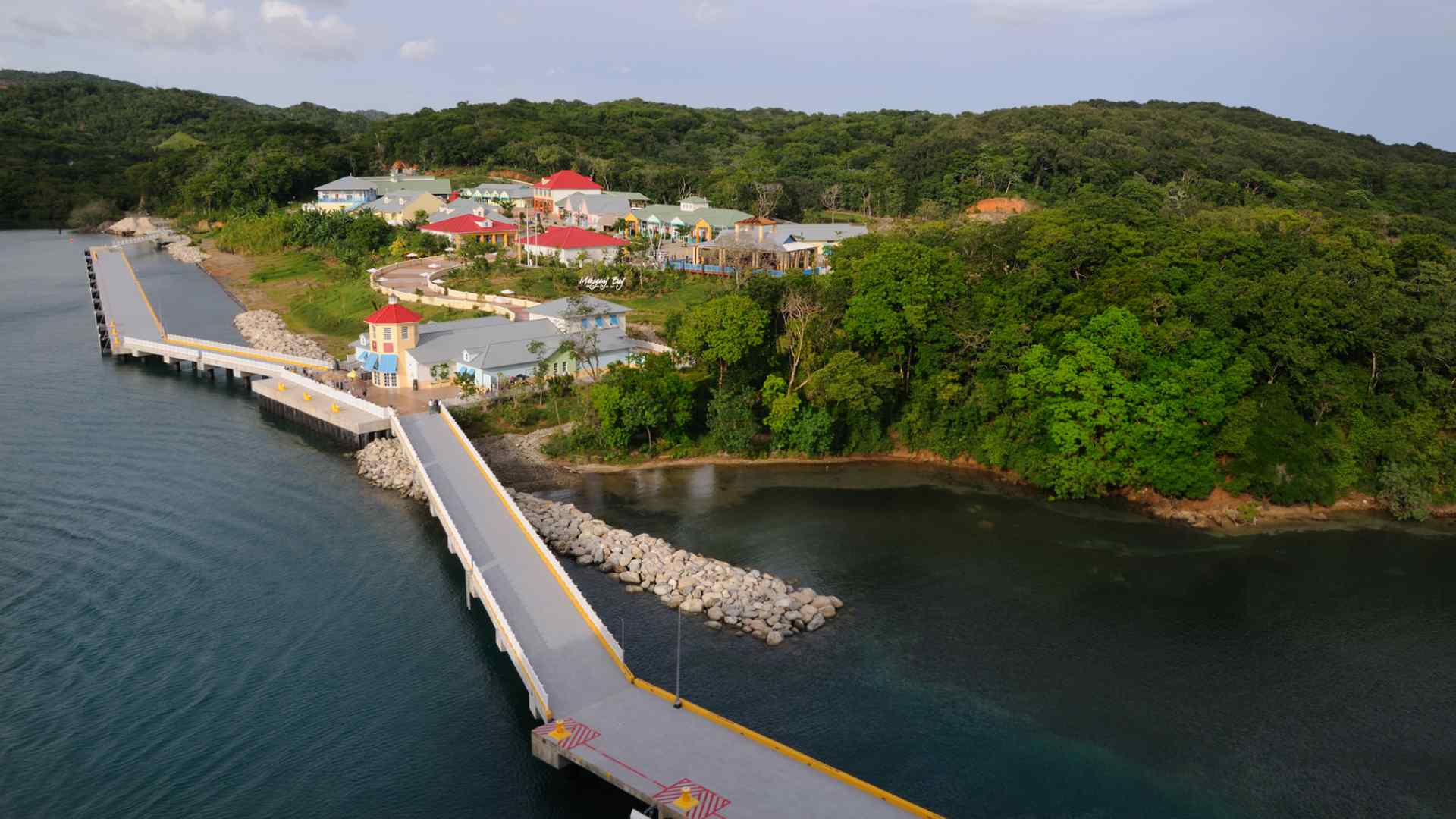 Mahogany Bay cruise pier winding through tropical forest