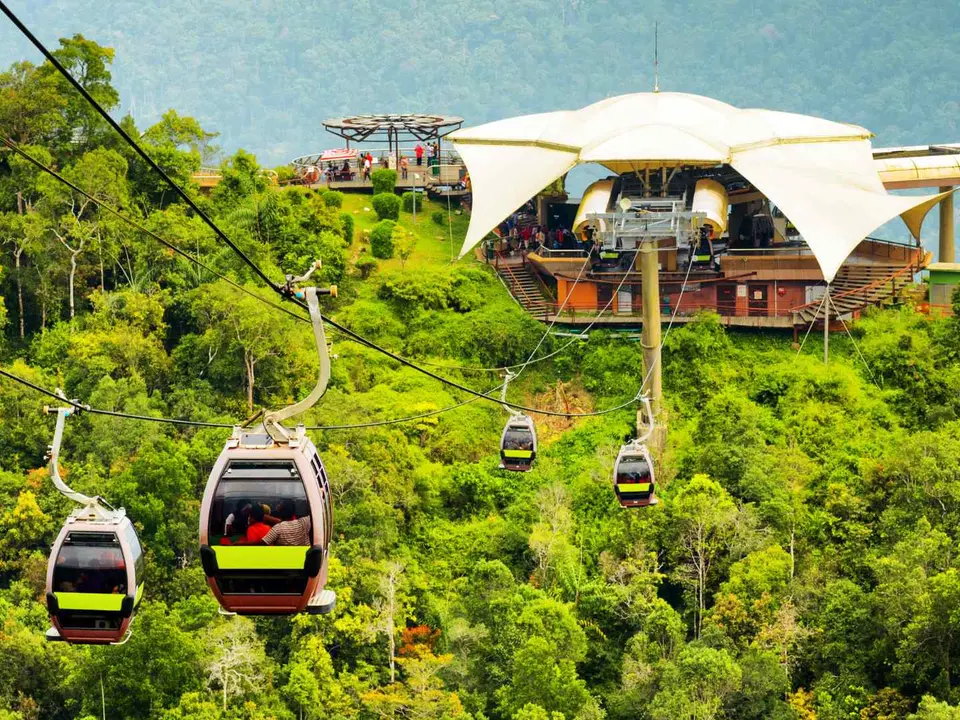 Langkawi SkyCab cable cars above tropical forest in Malaysia