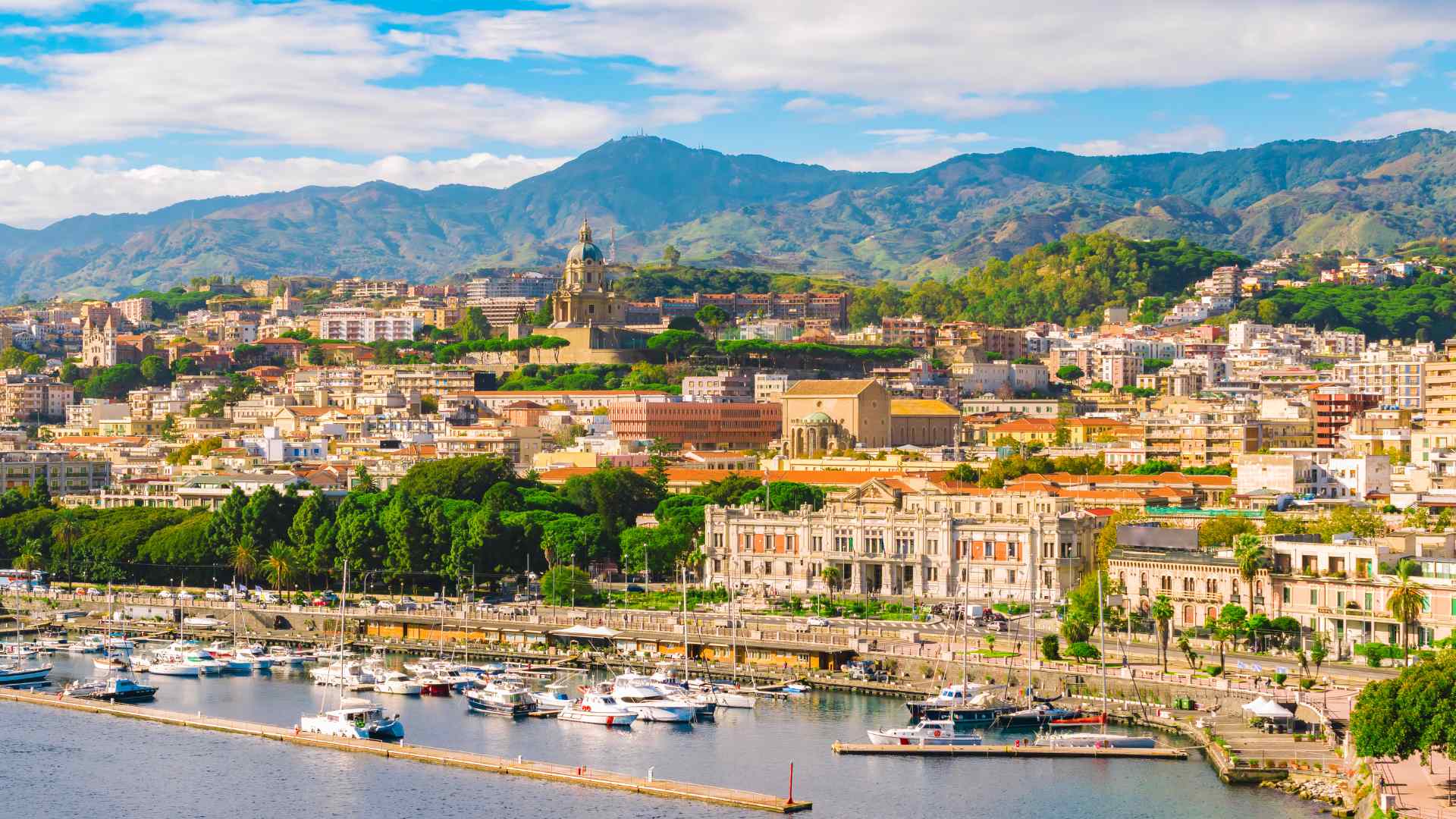 Messina harbor skyline backed by the Sicilian mountains