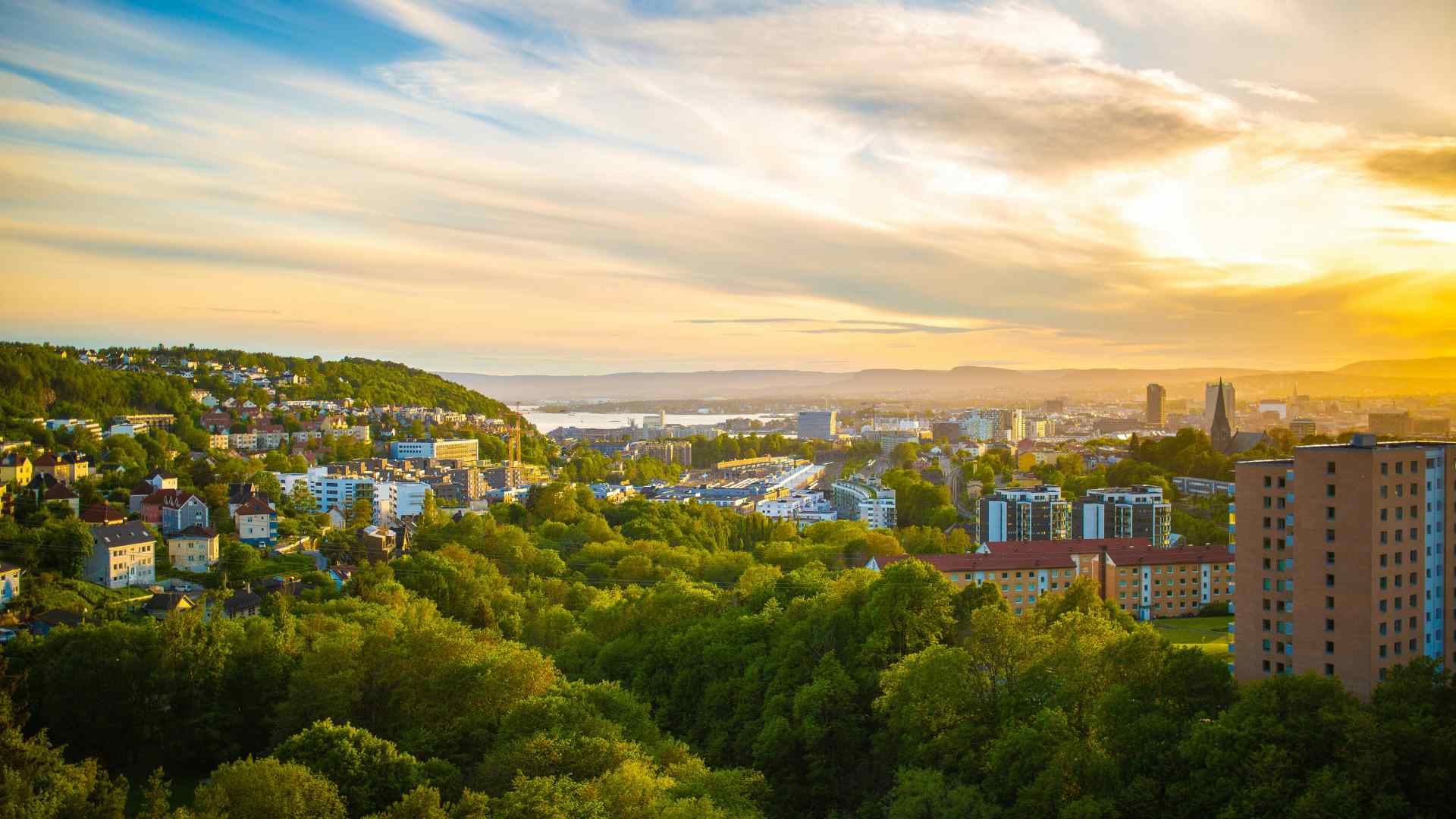 Sunset view across Oslo's green city neighborhoods