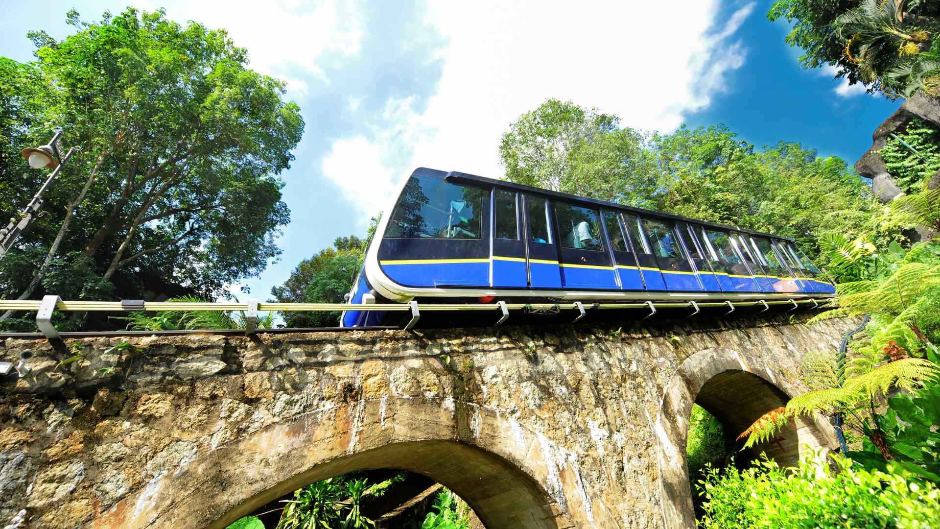 Funicular railway climbing Penang Hill through tropical forest