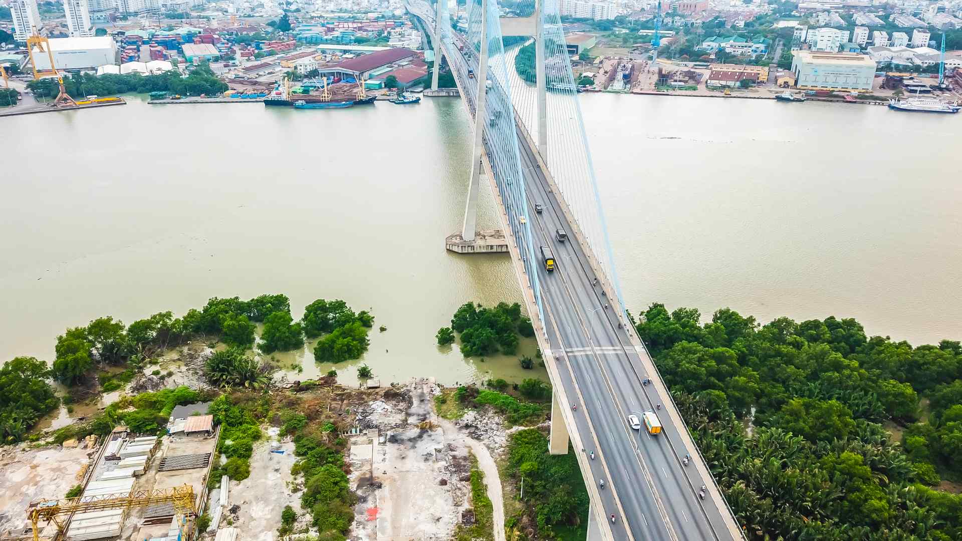 Cable-stayed bridge spanning a wide river in Vietnam