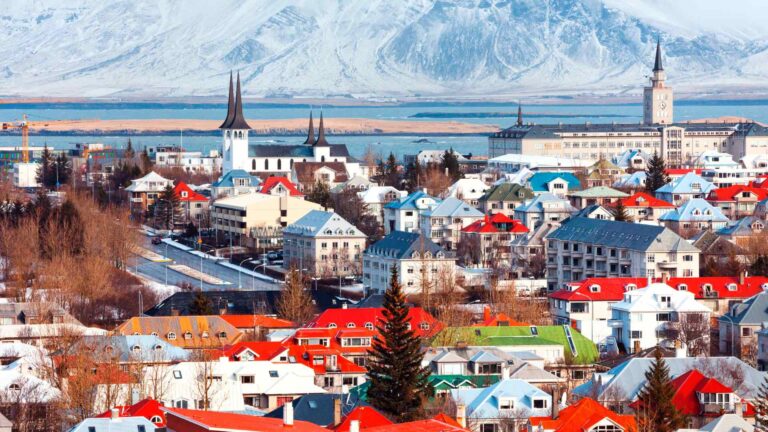 Reykjavik skyline with Hallgrimskirkja and snow-covered mountains
